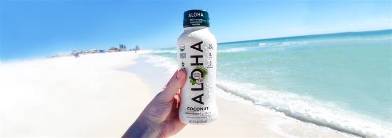 ALOHA coconut protein drink by the ocean