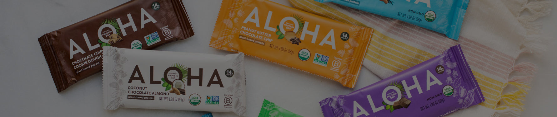 Protein bars in colorful Aloha packaging