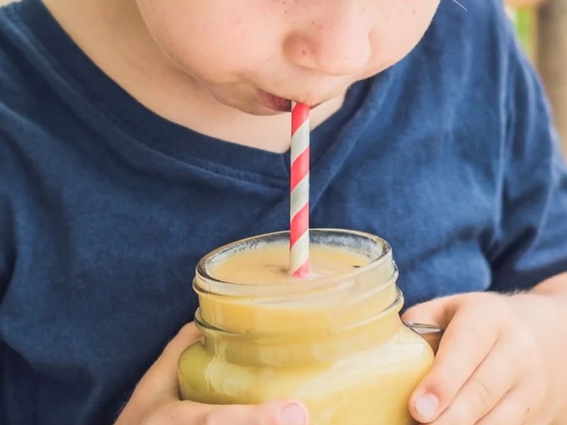 Kid drinking Protein Drink
