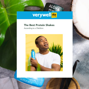 Man holding plant-based protein drink